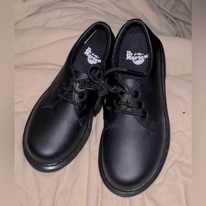 Kids black Dr Marten low top shoes